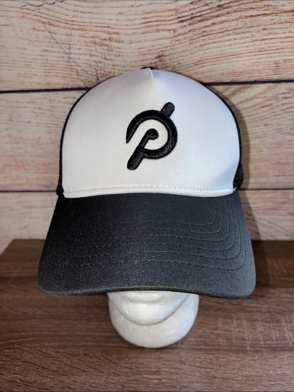 EUC Peloton Black and White Logo Trucker Cap